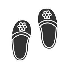 Bedroom slippers with flowers glyph icon