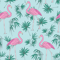 Beautiful tropical seamless pattern with pink flamingo birds and green jungle palm foliage hand drawn on blue background. Vector illustration for backdrop, wallpaper, fabric print, wrapping paper.