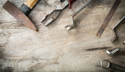 old tools on old wood background