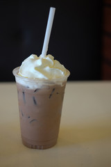 Iced cocoa drink with whipped cream
