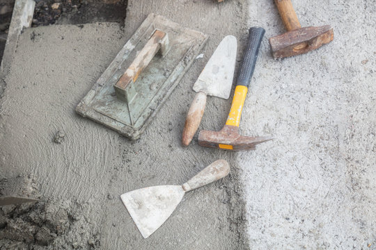 Renovating concrete pavement in home / budget DIY version.