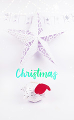 Fototapeta na wymiar Christmas Decoration with star gift box with christmas star and garland snow for holidays best background image for Holiday invitation and banners