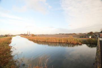 Obraz premium River named Rotte reflecting blue sky in Moerkapelle, Netherlands