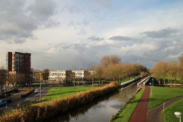 Ring canal of the Zuidplaspolder in the middle of village Nieuwerkerk aan den IJssel, Netherlands