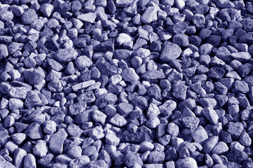 Pile of gravel stones in blue color