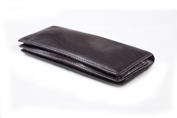 Dark brown wallet isolated