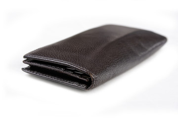 Dark brown wallet isolated