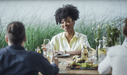 Friends Having Lunch Together at Restaurant