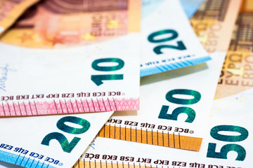 Pile of various kinds euro banknotes use for money or currency background and financial concepts.