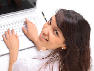 closeup.young woman working on laptop. the view from the top