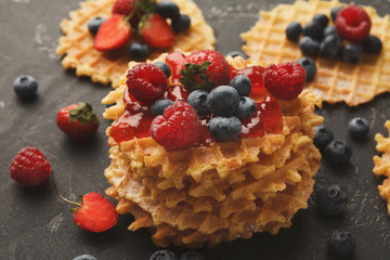 Round belgium waffles with berries