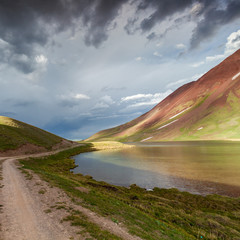 View of Tulpar Kul lake in Kyrgyzstan during the storm