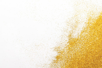 Golden glitter sand texture, abstract background.