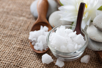 salt spa objects on textile background, wellness and relaxation concept