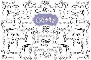 Hand drawn swirl and flourish love corners in the shape of a heart. Calligraphic design elements. Vintage Vector Illustration