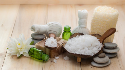 Salt spa and massage  objects over wooden background, wellness and relaxation concept
