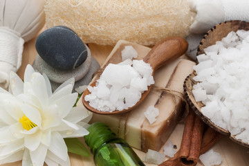 Salt spa and massage  objects over wooden background, wellness and relaxation concept