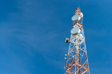 communication tower on blue sky background