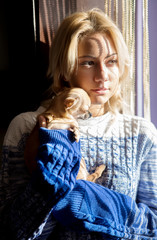 Fototapeta premium Young woman with pet dog