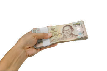Hand picking Thai currency, white background isolated