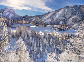 Beautiful winter snow-covered landscape and village, Selva di Cadore, Dolomites, Italy