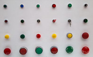 Various of start, stop, emergency button on control panel