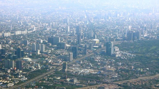 Big Asian city. View from the airplane window