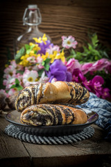 Sweet buns with poppy seed and frosting.