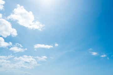 Naklejka na ściany i meble Beautiful summer blue sky and white fluffy clouds.