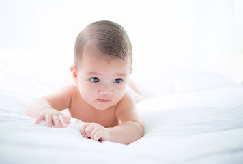 baby laying wearing diaper