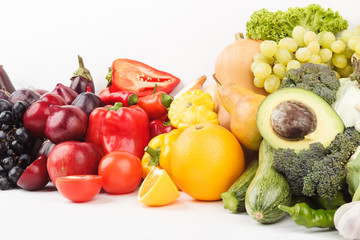 Set of multicolored fresh raw vegetables and fruits, isolated