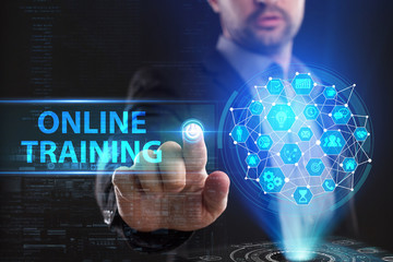 The concept of business, technology, the Internet and the network. A young entrepreneur working on a virtual screen of the future and sees the inscription: Online training
