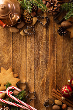 Christmas background with nuts, decorations and candy cane