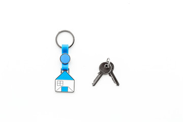 Get a mortgage. Apartment keys on white background top view copyspace