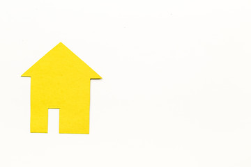 Obraz na płótnie Canvas Get a mortgage. House silhouette on white background top view copyspace