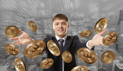 Businessman throwing bitcoin coin