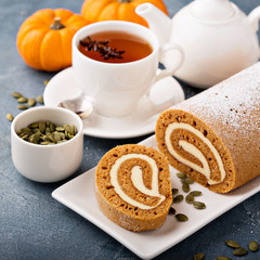 Pumpkin roll with cream cheese frosting
