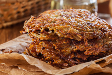 Hash brown, potato pancakes on paper