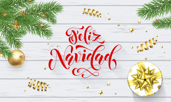 Feliz Navidad Spanish Merry Christmas holiday golden decoration on Xmas tree, calligraphy font for greeting card white wooden background. Vector Christmas or New Year golden shiny gift confetti design