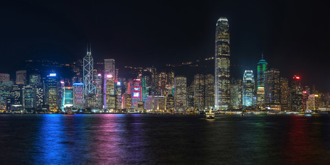 Fototapeta na wymiar Colorful panoramic view of Hong Kong skyline on night time seen from Kowloon. Hong Kong, China.