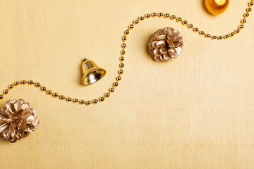Christmas background with golden pinecones