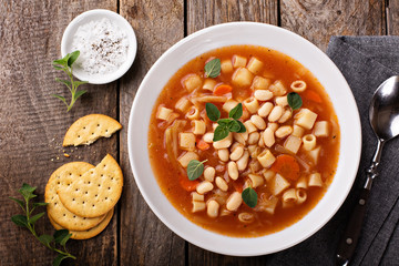 Vegetarian minestrone soup with pasta and beans - obrazy, fototapety, plakaty