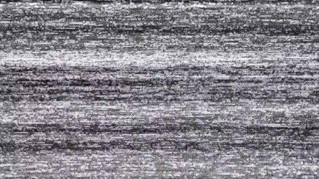 Static tv noise caused by bad signal reception, black and white