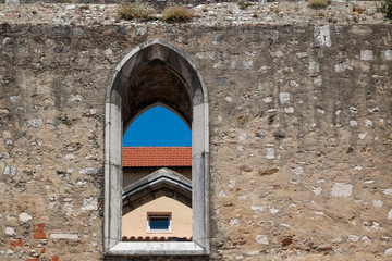 Wall with an arc window, Lisbon, Portugal