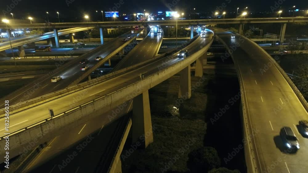 Wall mural video ,of traffic on city streets at night. aerial viewand top view of traffic on freeway,video 4k