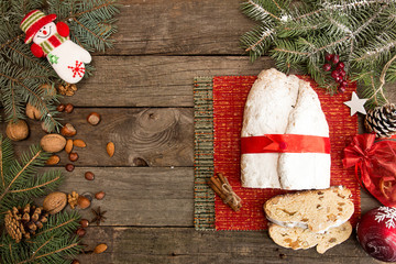 Traditional Christmas dresden cake stollen with candied fruits and almonds. Christmas New Year...