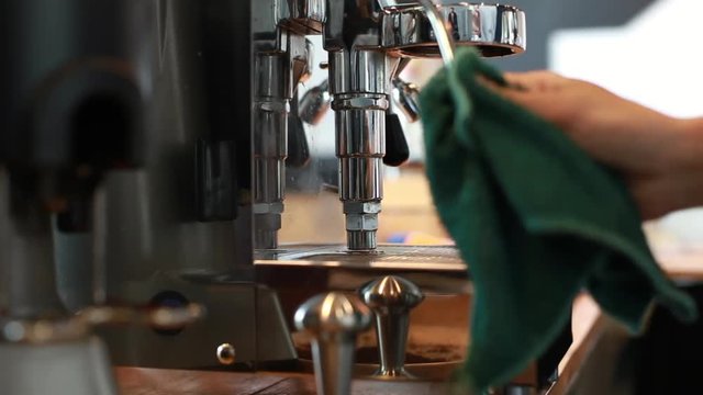 Cleaning the of a coffee machine.