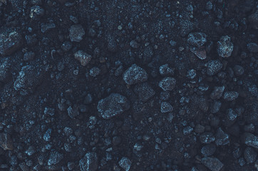 Black ground covered with frost