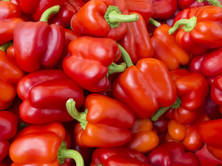 Lot of red bell peppers.