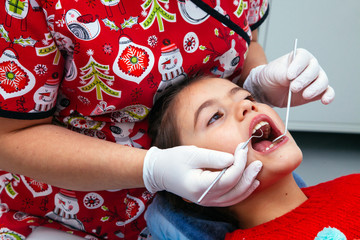 Treatment office children dentist teeth small girl teen red doctor new year discount woman clean clinic quietly comfortably